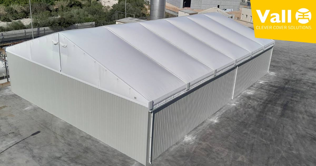 Cómo compensar la huella de carbono de tu empresa - Naves desmontables y carpas industriales